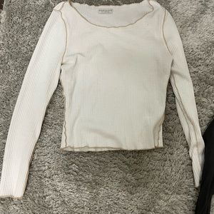 White and tan long sleeve shirt. Size small. More fitted.
